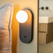 GOOD & MOJO Vägglampa Java, svart, glas/bambu, stickkontakt