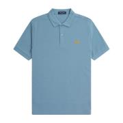 Fred Perry Slim Fit Plain Polo i Ash Blue/Golden Hour Blue, Herr