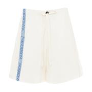 JW Anderson Shorts med logo-tape detaljer i bomull/linne White, Dam