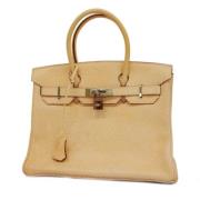 Hermès Vintage Pre-owned Tyg handvskor Beige, Dam