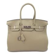 Hermès Vintage Pre-owned Laeder handvskor Beige, Dam