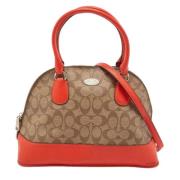 Coach Pre-owned Pre-owned Belagd canvas handvskor Orange, Dam