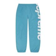 Supreme Exklusiv Spellout Track Pant i Aqua Blue, Herr