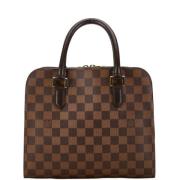 Louis Vuitton Vintage Pre-owned Plast handvskor Brown, Dam