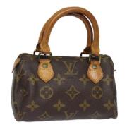 Louis Vuitton Vintage Pre-owned Canvas handvskor Brown, Dam