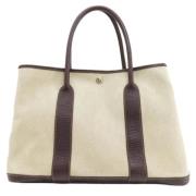 Hermès Vintage Pre-owned Canvas handvskor Beige, Dam