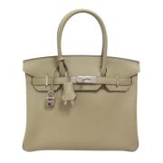 Hermès Vintage Pre-owned Laeder handvskor Beige, Dam