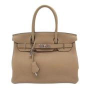 Hermès Vintage Pre-owned Laeder handvskor Beige, Dam