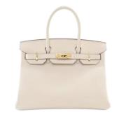 Hermès Vintage Pre-owned Laeder handvskor Beige, Dam