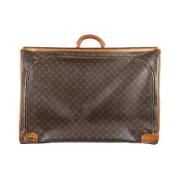 Louis Vuitton Vintage Pre-owned Tyg resvskor Brown, Dam