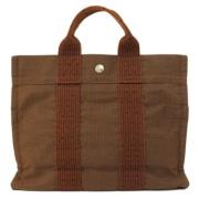 Hermès Vintage Pre-owned Canvas handvskor Brown, Dam