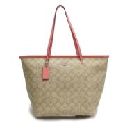 Coach Pre-owned Pre-owned Belagd canvas axelremsvskor Beige, Dam