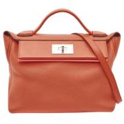 Hermès Vintage Pre-owned Laeder handvskor Orange, Dam