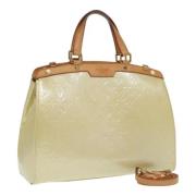 Louis Vuitton Vintage Pre-owned Laeder handvskor Beige, Dam