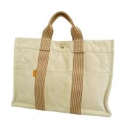 Hermès Vintage Pre-owned Canvas handvskor Beige, Dam