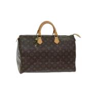 Louis Vuitton Vintage Pre-owned Canvas handvskor Brown, Dam