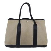 Hermès Vintage Pre-owned Canvas handvskor Beige, Dam