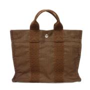 Hermès Vintage Pre-owned Canvas handvskor Brown, Dam