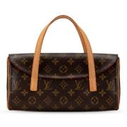 Louis Vuitton Vintage Pre-owned Canvas handvskor Brown, Dam