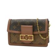 Louis Vuitton Vintage Pre-owned Tyg axelremsvskor Brown, Dam