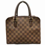 Louis Vuitton Vintage Pre-owned Tyg handvskor Brown, Dam