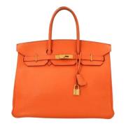 Hermès Vintage Pre-owned Laeder handvskor Orange, Dam