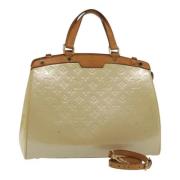 Louis Vuitton Vintage Pre-owned Laeder handvskor Beige, Dam