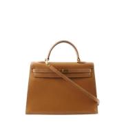 Hermès Vintage Pre-owned Laeder handvskor Beige, Dam