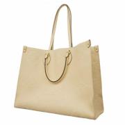 Louis Vuitton Vintage Pre-owned Tyg handvskor Beige, Dam