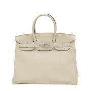 Hermès Vintage Pre-owned Laeder handvskor Beige, Dam