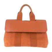 Hermès Vintage Pre-owned Canvas handvskor Orange, Dam