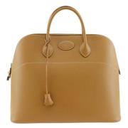 Hermès Vintage Pre-owned Laeder handvskor Beige, Dam