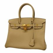 Hermès Vintage Pre-owned Laeder handvskor Beige, Dam