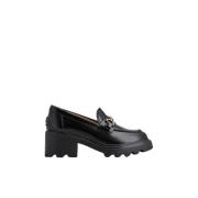 Tod's Moccasins i borstat kalvskinn med T-Clamp tillbehör Black, Dam