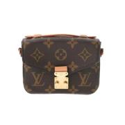 Louis Vuitton Vintage Pre-owned Canvas axelremsvskor Brown, Dam