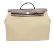 Hermès Vintage Pre-owned Canvas handvskor Beige, Dam