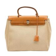 Hermès Vintage Pre-owned Canvas handvskor Beige, Dam