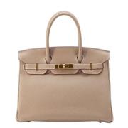 Hermès Vintage Pre-owned Laeder handvskor Beige, Dam