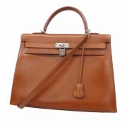 Hermès Vintage Pre-owned Laeder handvskor Brown, Dam