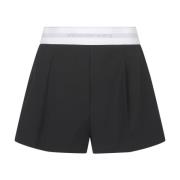 Alexander Wang Svarta höga midjade veckade shorts med logoelastik Blac...