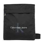 Calvin Klein Jeans Stilig tryckt axelväska med dragkedja Black, Dam