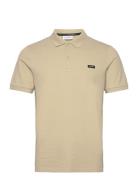 Stretch Pique Slim Button Polo Tops Polos Short-sleeved Beige Calvin K...